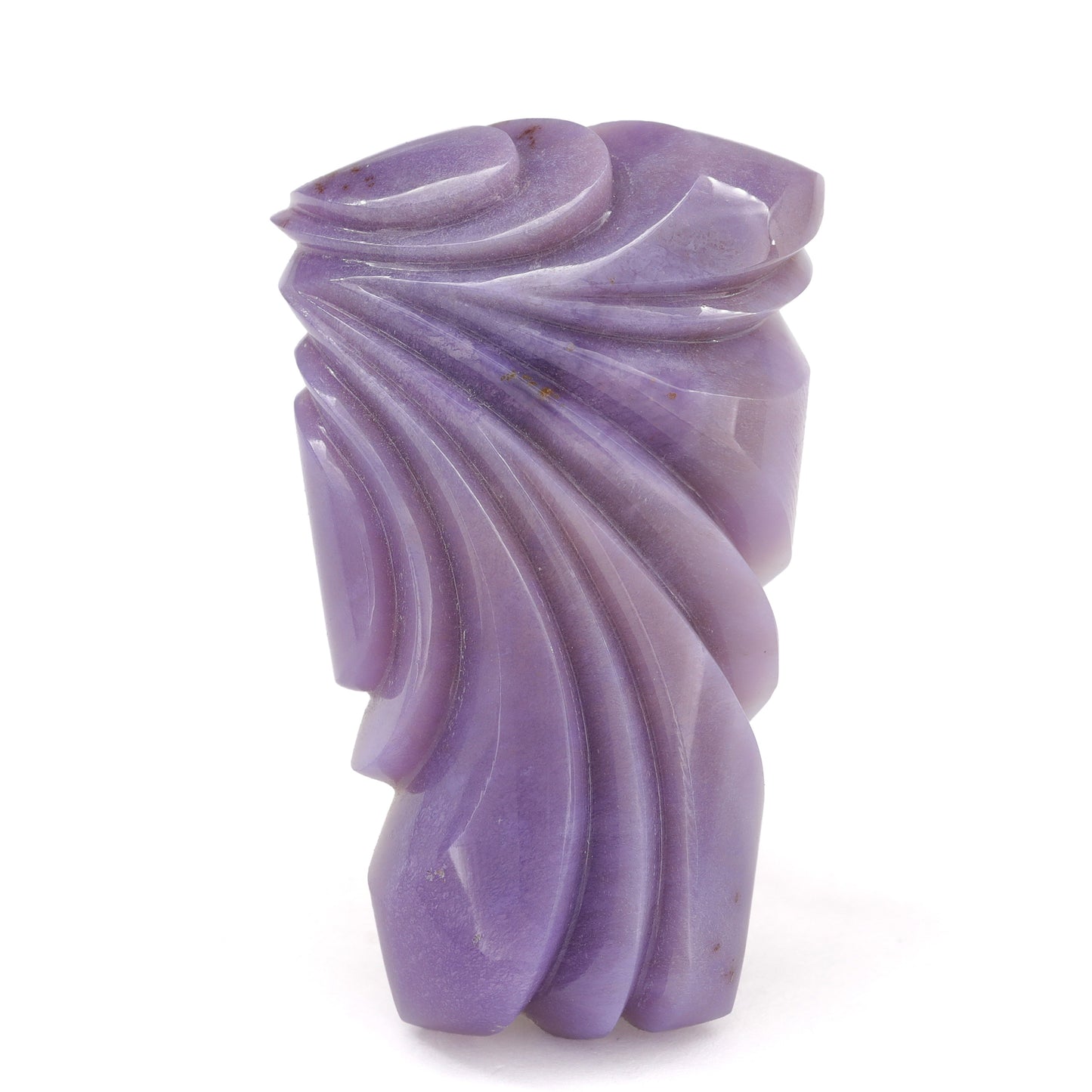 Purple carved stone on a white background