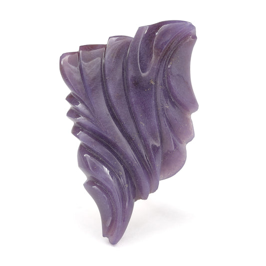 Arizona Purple Chalcedony carved by Nick Alexander on white background