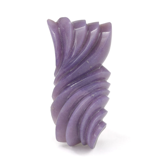 Nick Alexander carved Arizona Purple Chalcedony on white background