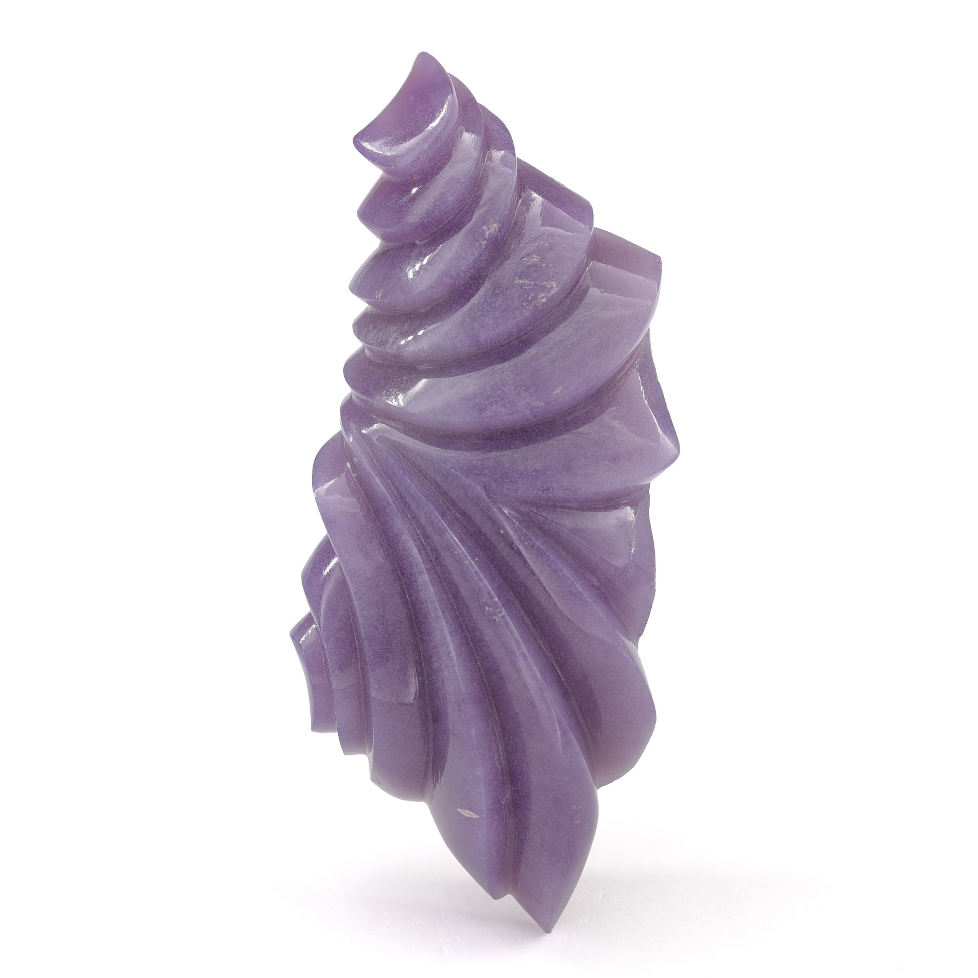 Purple Chalcedony carved by Nick Alexander on white background