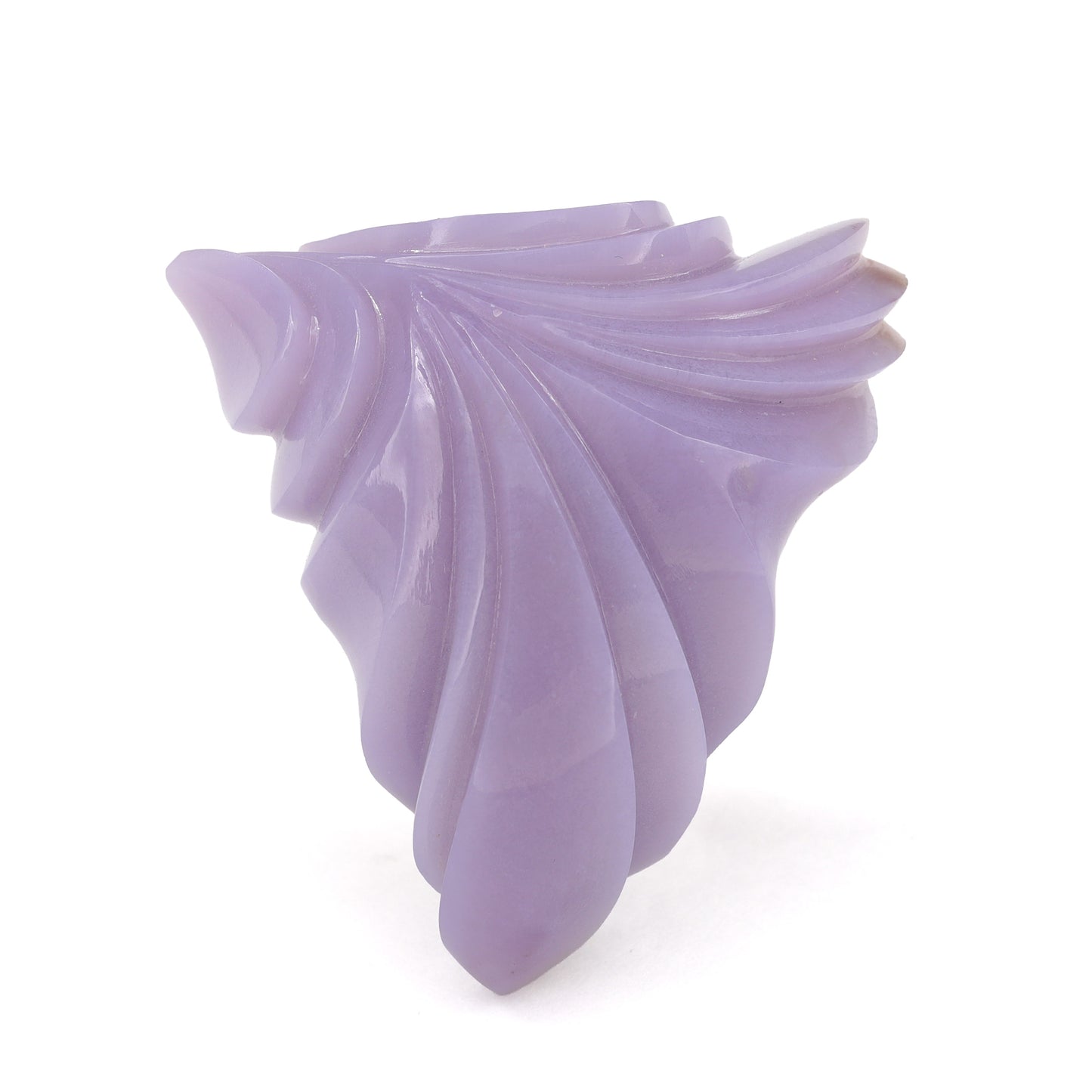 Purple Chalcedony from Arizona carved by Nick Alexander on white background